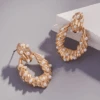 Pearl Pave On Grooved Metal Earrings